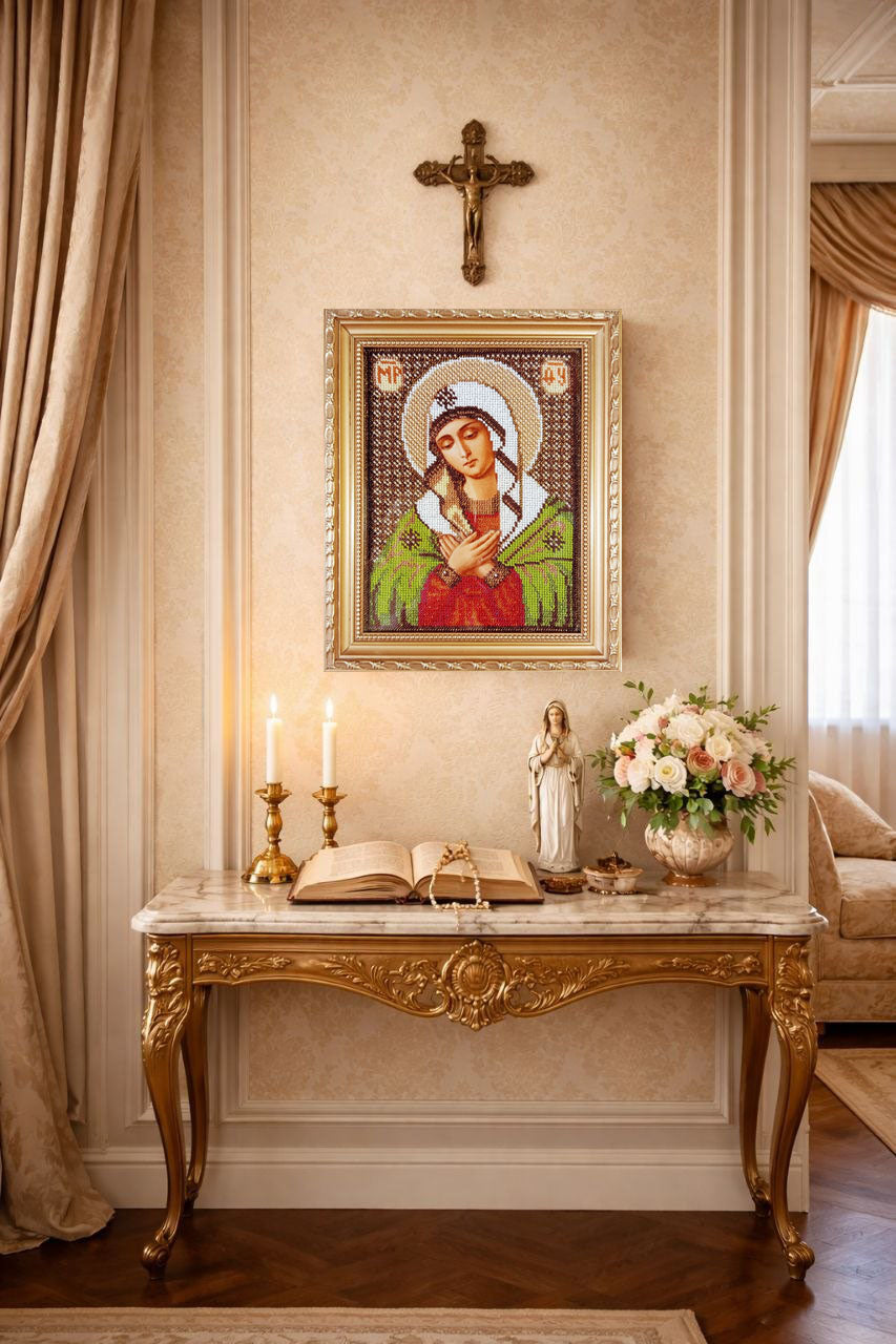 Virgin Mary icon on wall, framed religious wall art in home altar interior