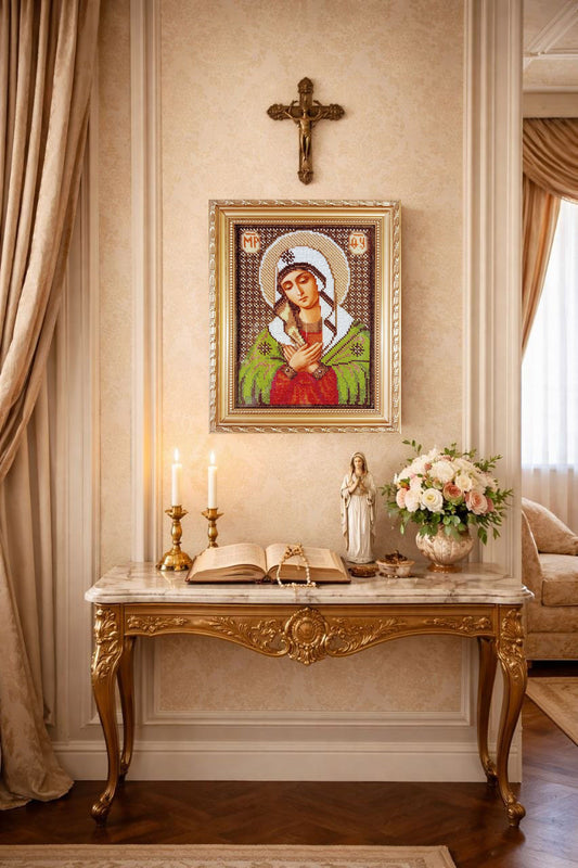 Virgin Mary icon on wall, framed religious wall art in home altar interior