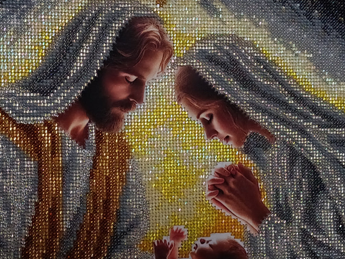 Evening close-up of Mary and Joseph in Incarnation showing how the reflective beads respond to directional light