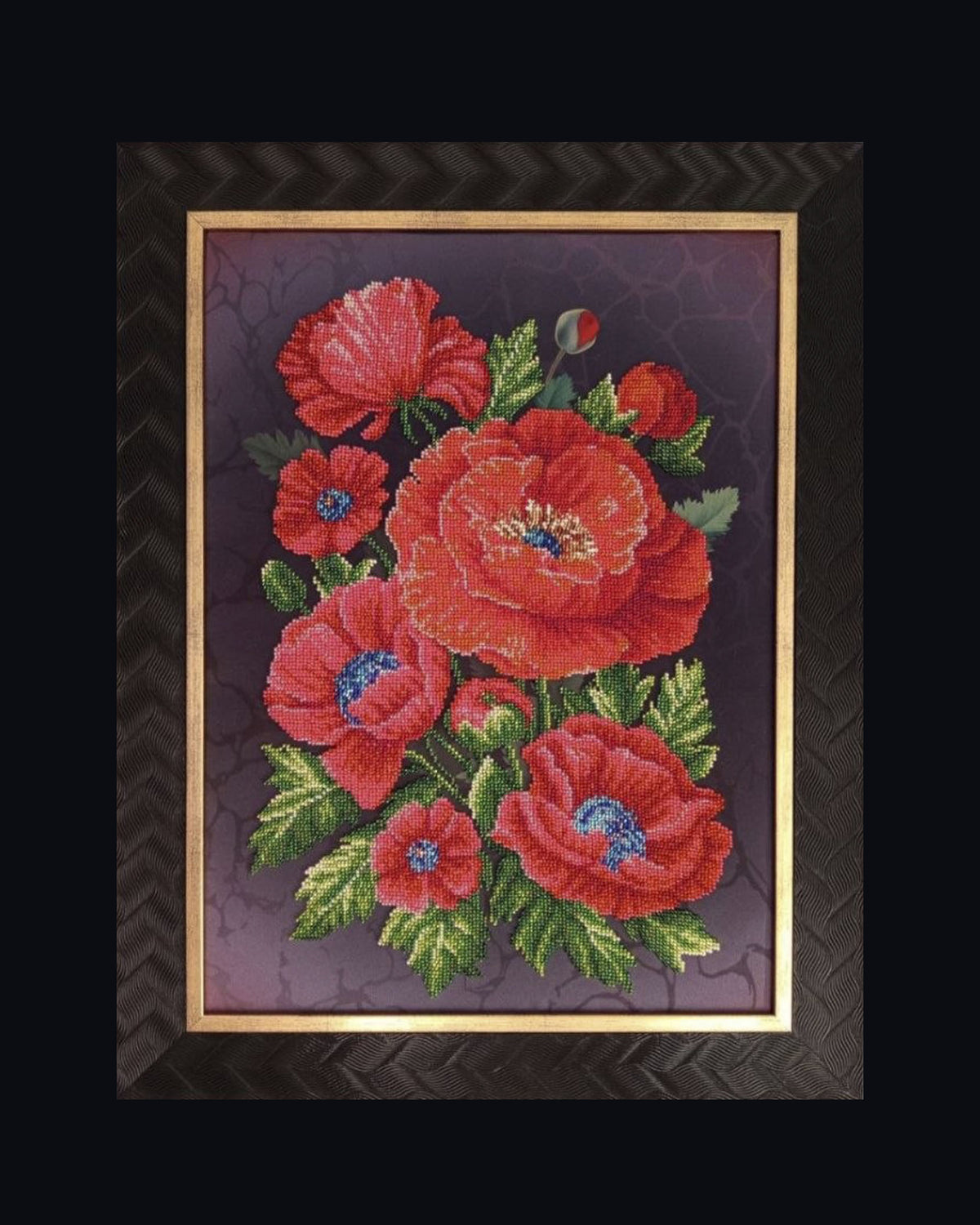 Poppies, original framed bead embroidery artwork with vivid red poppies and green foliage on a dark plum background