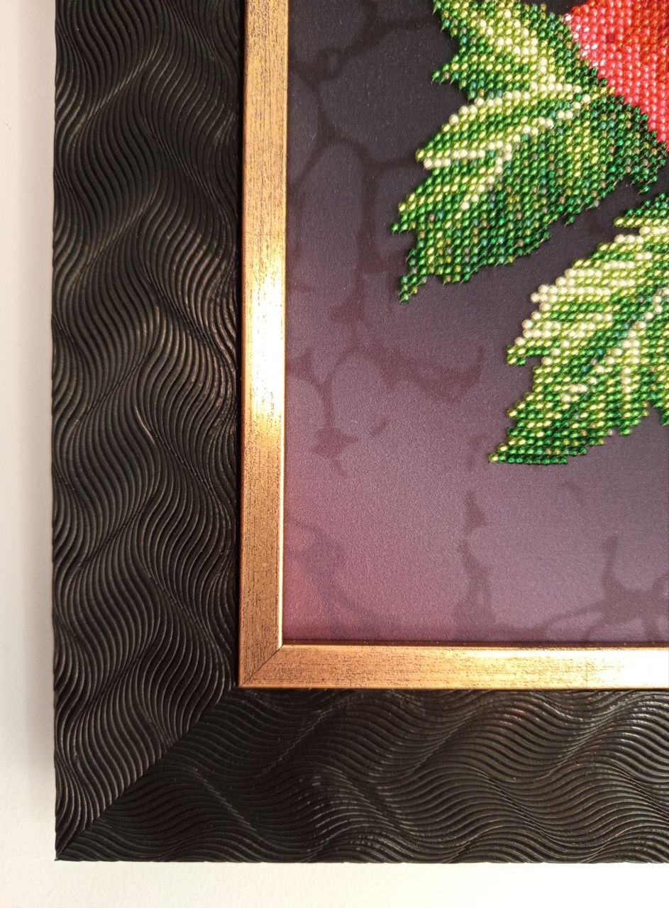 Close-up of the dark textured frame and antique-gold inner border of Scarlet Poppies